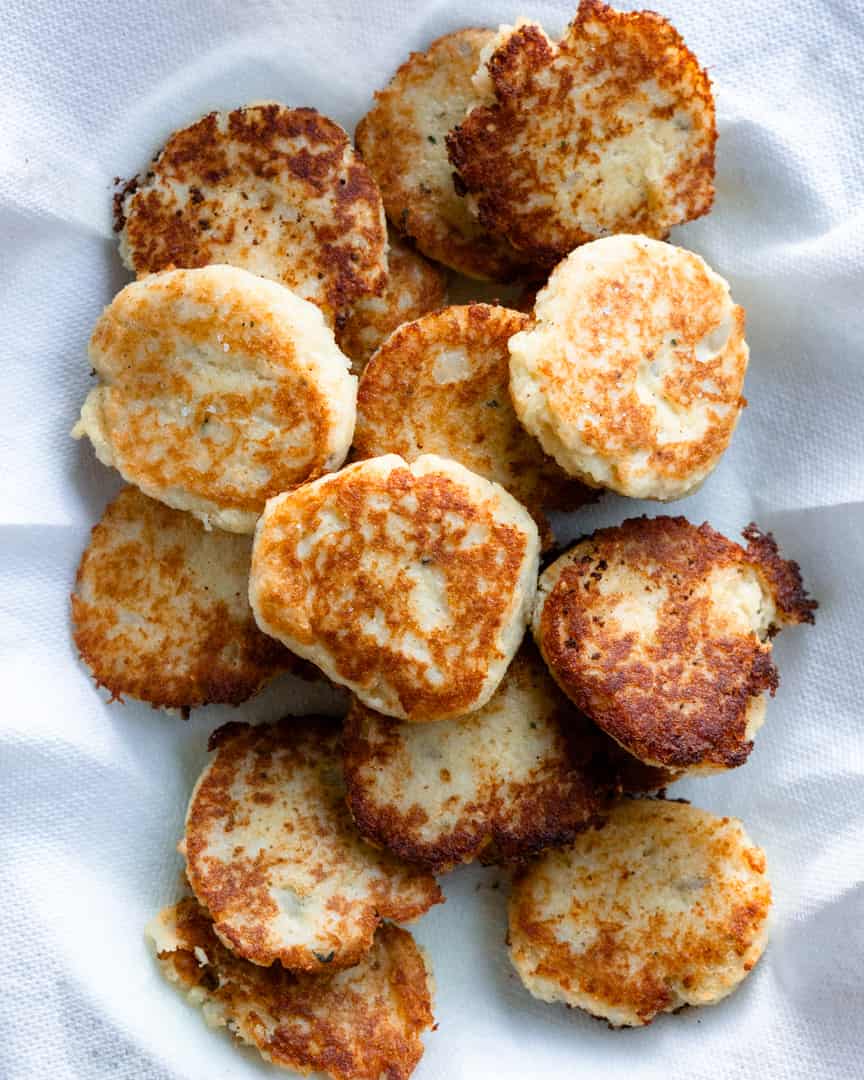 A platter of fried potato pancakes.