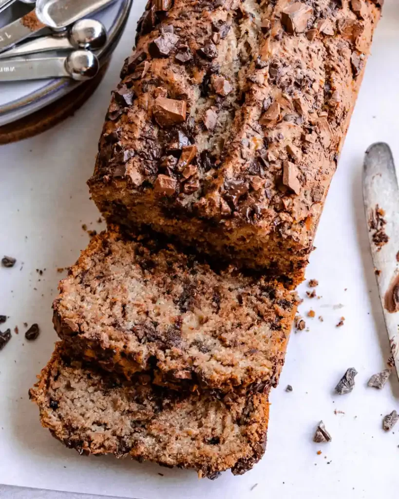 Super Chocolaty Banana bread with two slices cut and laying stacked on top of each other
