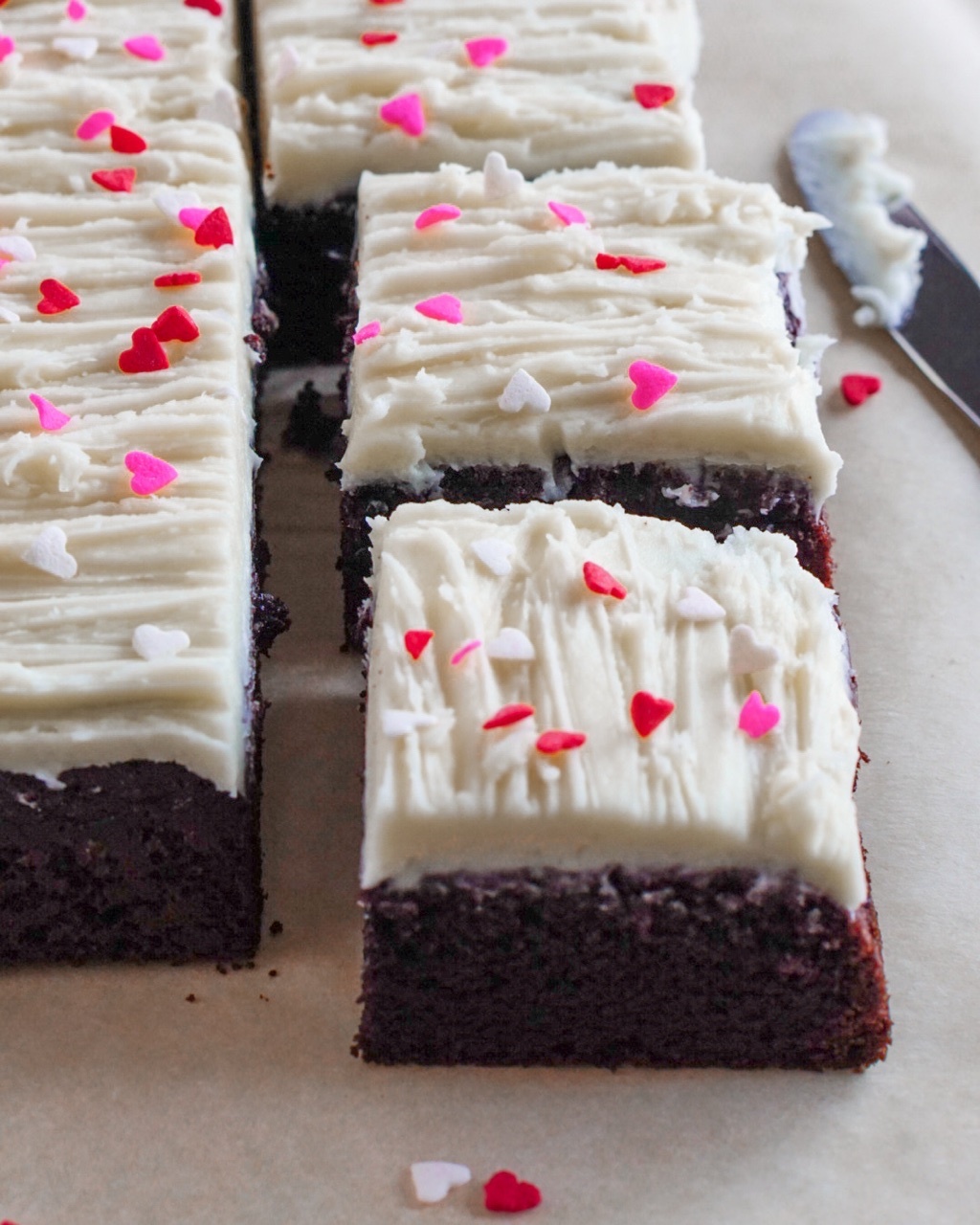 Cut up squares of Chocolate cake