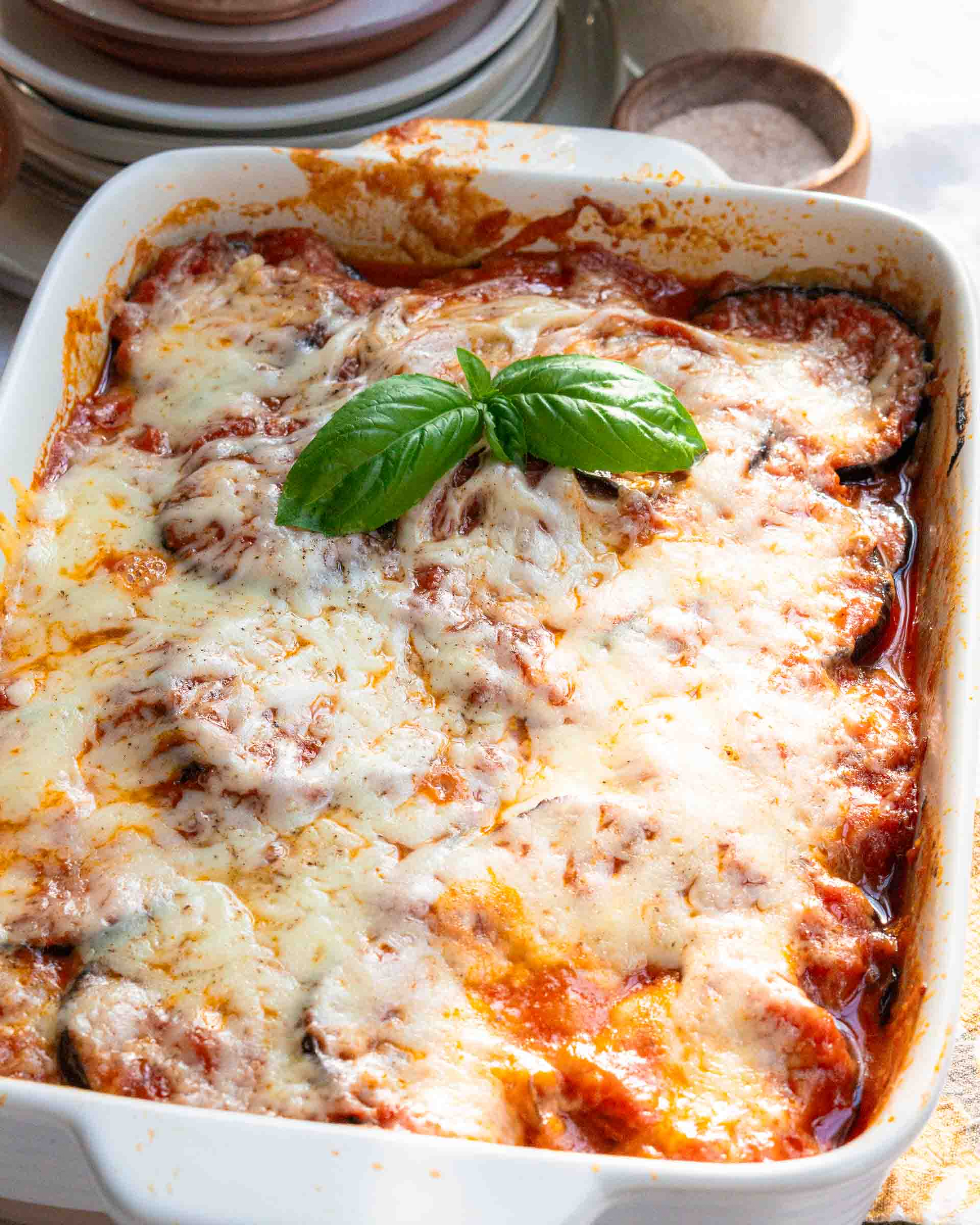 A baking pan of eggplant parmesan.