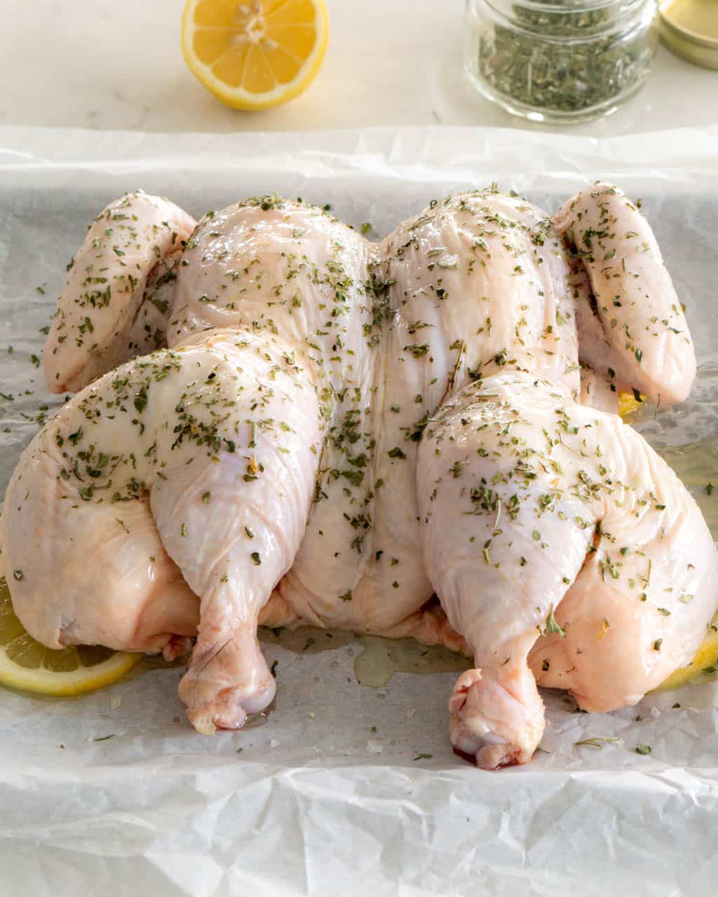 Uncooked Chicken with herbs