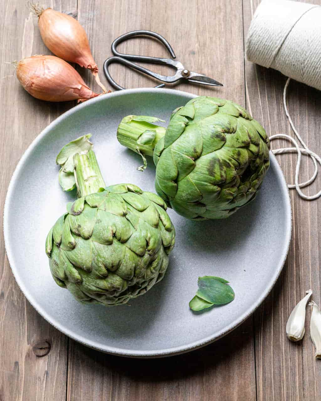 Two Artichokes on a Plate