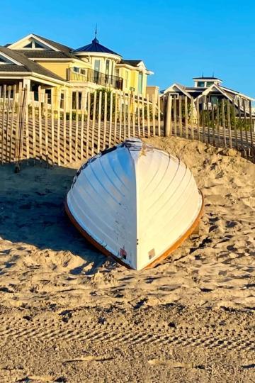 boat flipped upside down in sand