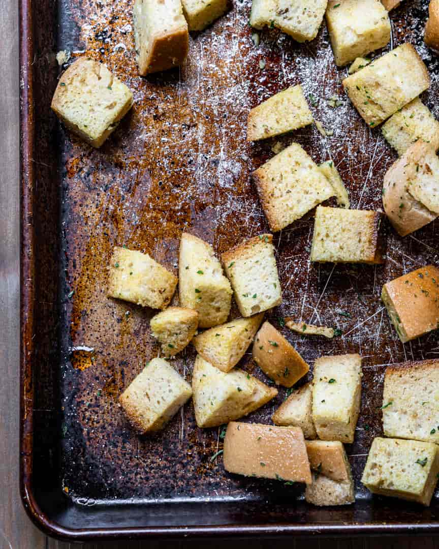 Homemade croutons, seasoned and uncooked