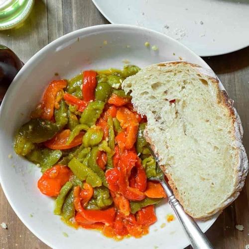 Roasted Peppers in a Bowl With Bread
