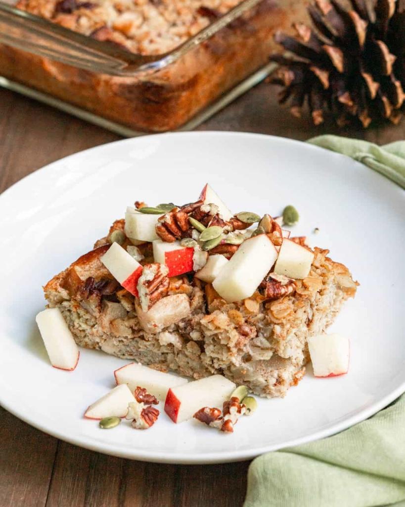 baked oatmeal topped with apples and nuts