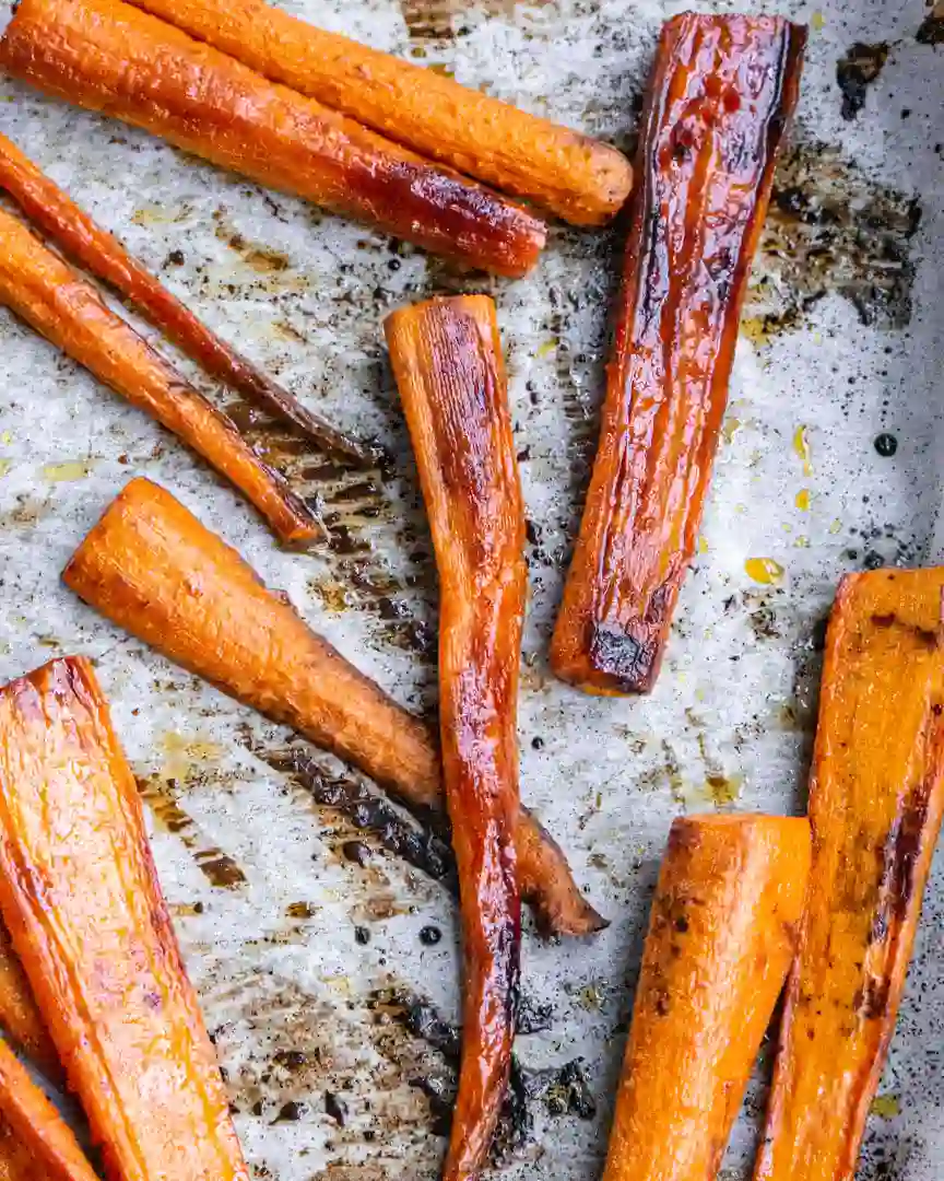 Roasted carrots on baking sheet