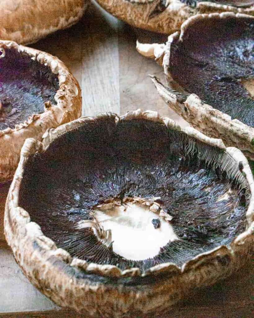 upside down portobello mushroom with stems and gills removed and