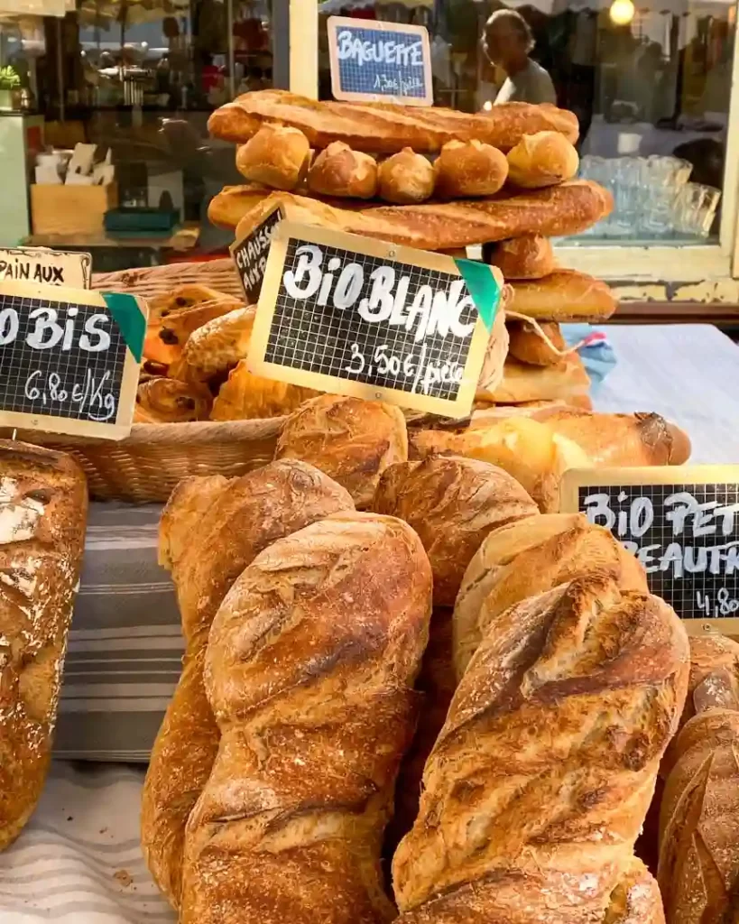 Rustic bread on display at farmers market.