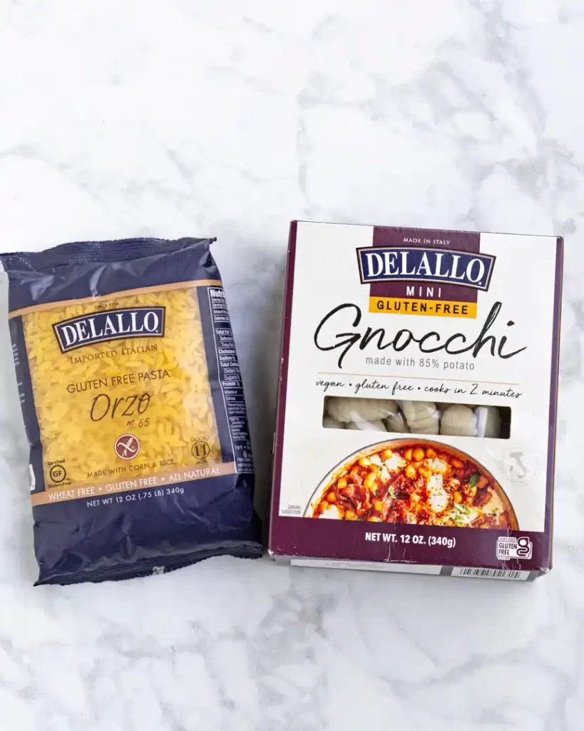 A package of gluten-free orzo and a box of gluten-free gnocchi