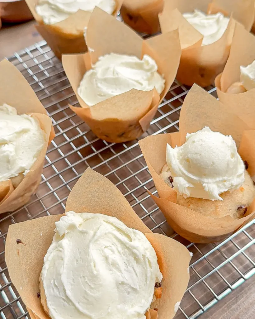 Frosting scooped onto a muffin but not yet smoothed out.